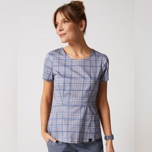 Jaanuu Peplum Scrub Top